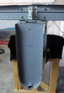 The holes for the four bolts that attach the horizontal stabilizer to the F-711C vertical bars were easy to drill.
