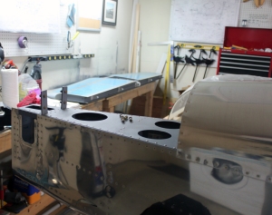 Of course, as soon as it is attached, the horizontal stabilizer has to come back off for fitting the elevators.  Also, with it attached, I don't have enough room in the garage to access our attic (where the rest of the empennage is stored).